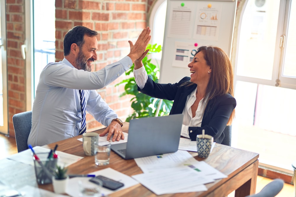 Team arranging presentation pages before a meeting